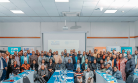 Participants pose for a photo at the Data User-Producer Symposium