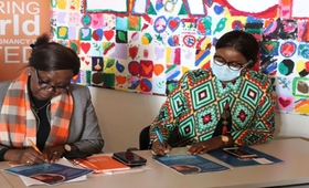 UNFPA and UN Women Country Representatives signing the pledge of committment to end child marriages