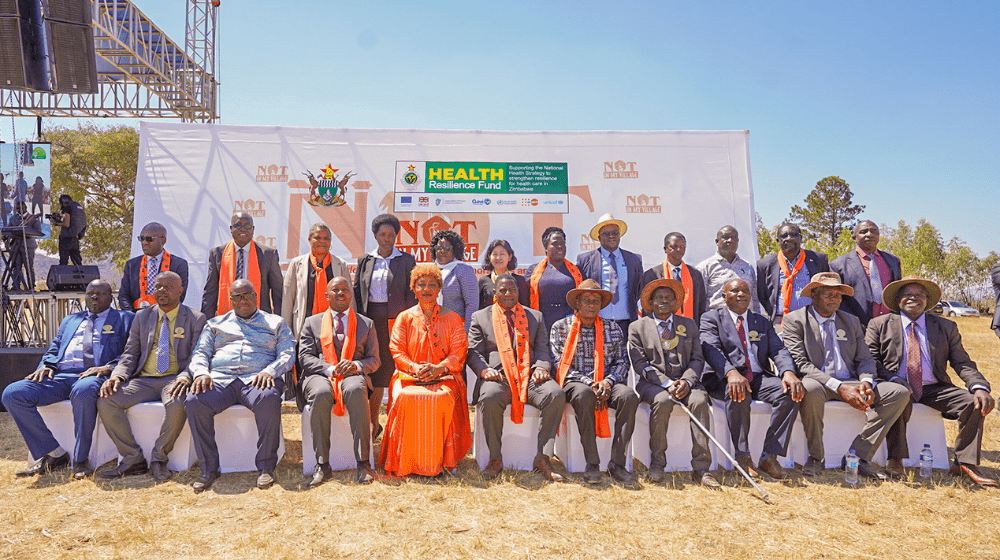 Government of Zimbabwe officials and partners pose for a group picture after World population Day 2024 commemorations at Nzvimbo High School in Mazowe District, Mashonaland Central