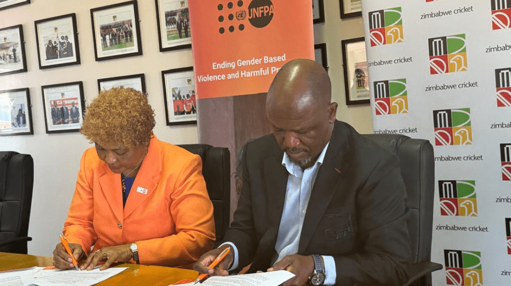 UNFPA Representative Ms Miranda Tabifor and Zimbabwe Cricket’s Managing Director Givemore Makoni signing the MOU.