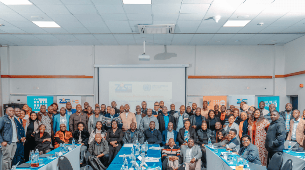 Participants pose for a photo at the Data User-Producer Symposium