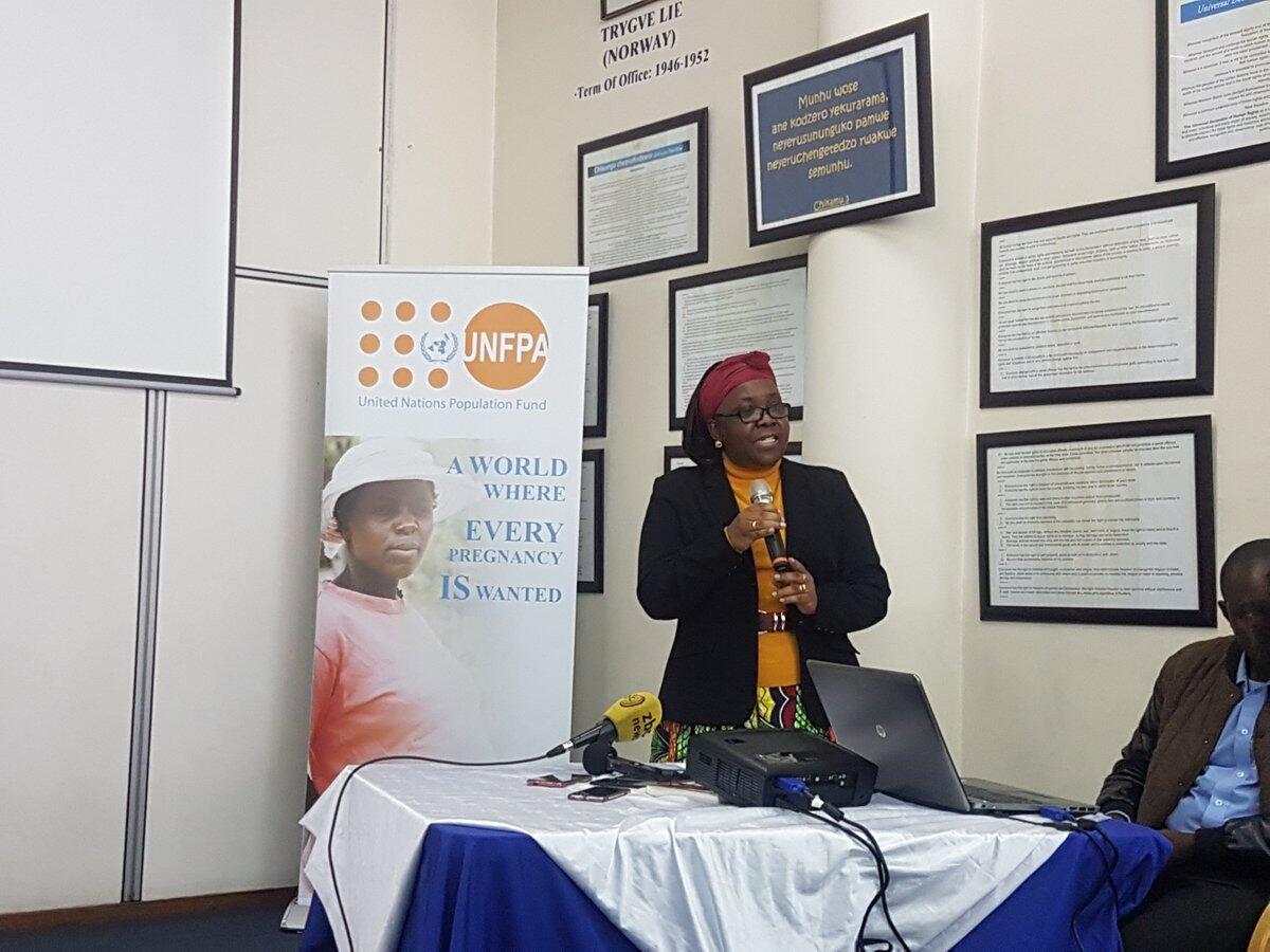 UNFPA Representative Dr Esther Muia speaking at a media briefing to mark World Population Day